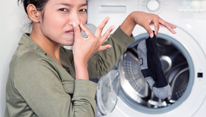 علت بوی بد لباسشویی